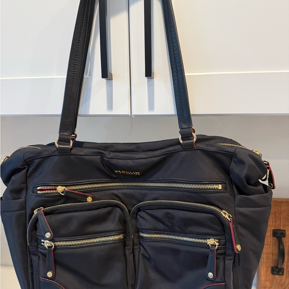 EUC MZ WALLACE TRIBECA TRAVEL TOTE. USED A FEW TIMES. 
COLOR- BLACK.